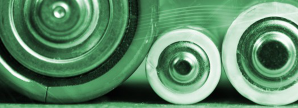 Three batteries of different sizes are lined up vertically, shown in close-up with a green tint.