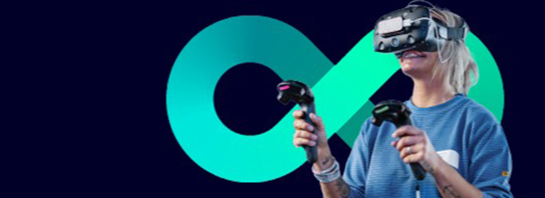 Person wearing a VR headset and holding controllers, standing in front of a large teal infinity symbol.