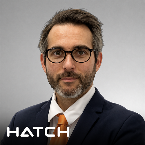 Thomas Bibienne in front of a plain background, with HATCH logo in corner.